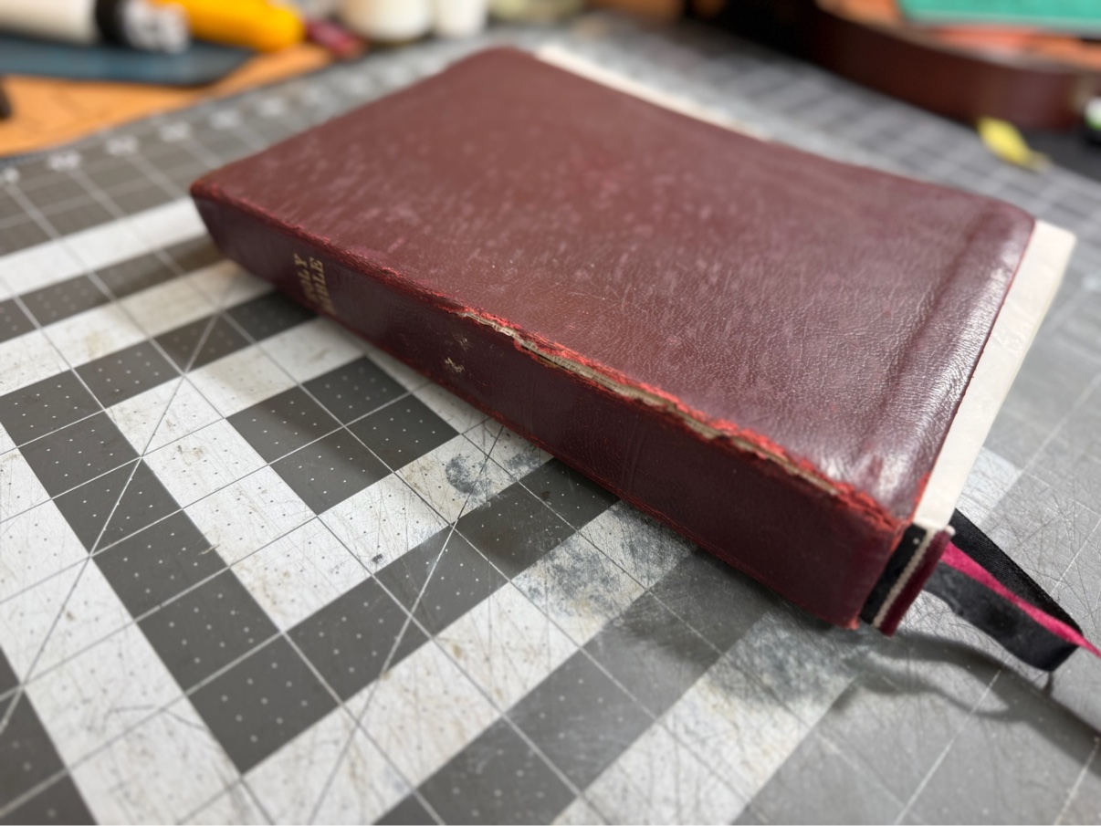 Worn Bible cover before rebind